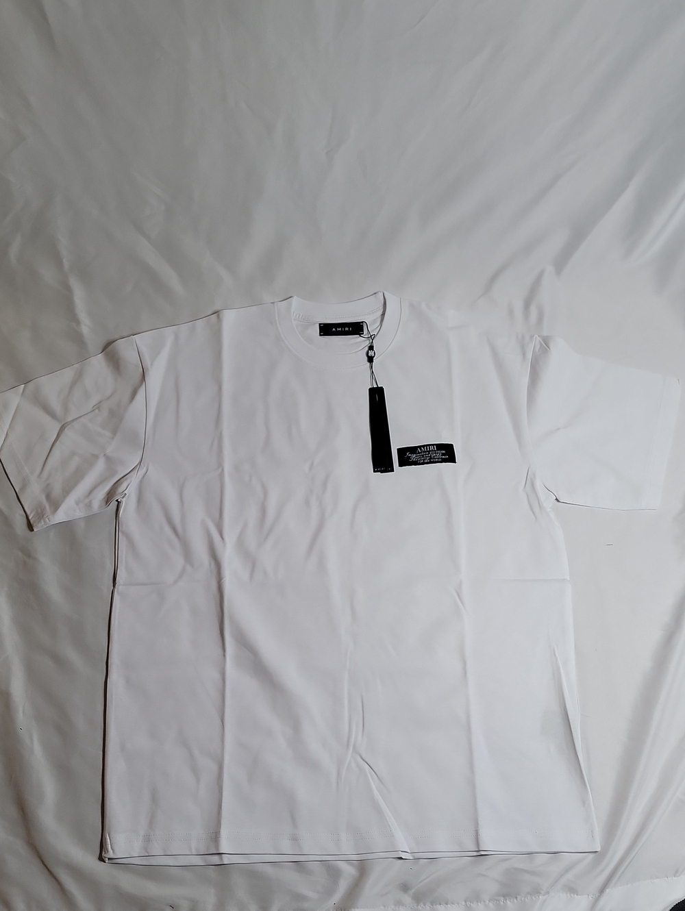 AMIRI White Short Sleeve T-Shirt with Black Chest Patch